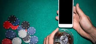 Antarmuka aplikasi mobile joglototo4d menampilkan permainan slot dan opsi taruhan sportsbook